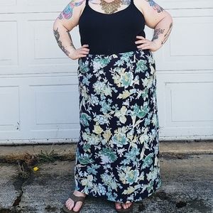 Maggie Mcnaughton black with green floral skirt